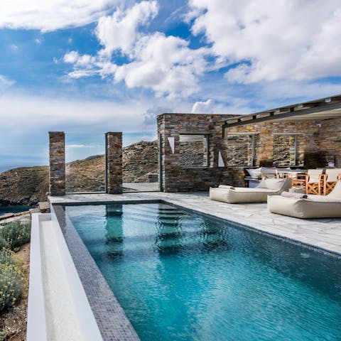 Cool off with a swim in the dazzling infinity pool, admiring the Aegean views