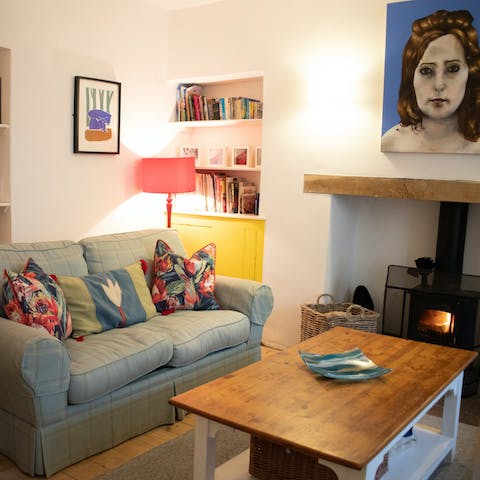 Curl up beside the wood burner for cosy film nights