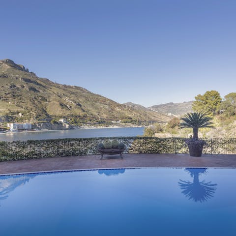 Enjoy blissful views while swimming in the private pool 