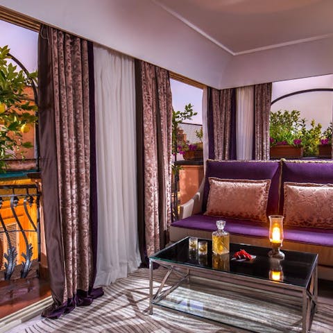 Tuck yourself away with a nightcap at your suite's seating area