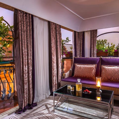 Tuck yourself away with a nightcap at your suite's seating area