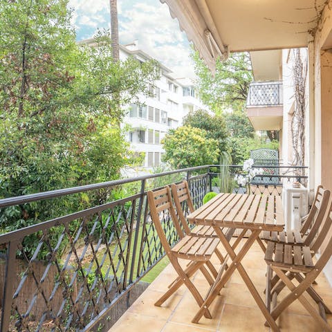 Sip sundowners on the private balcony with leafy surroundings
