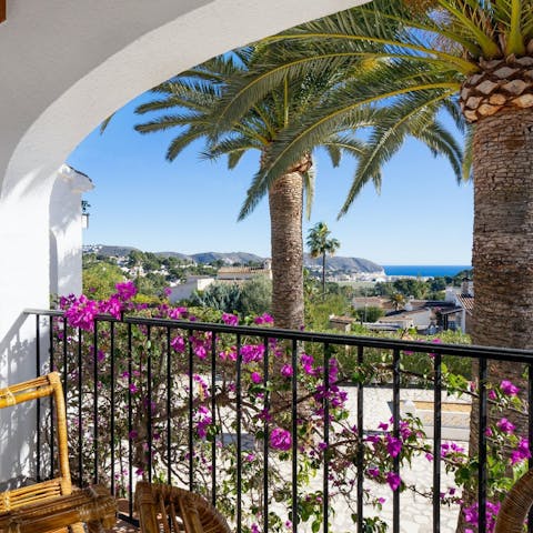 Enjoy views of the ocean and mountains from your pretty and private balcony