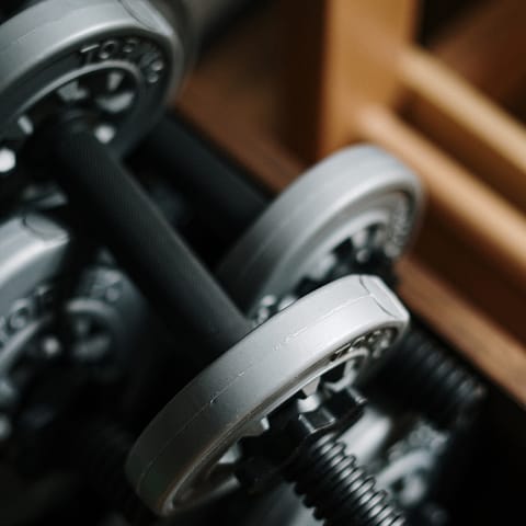 Keep on top of your fitness in the shared gym available to guests