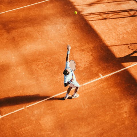 Watch an exciting game at nearby Roland Garros Stadium
