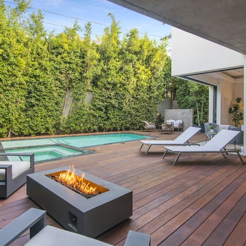 Feel a wonderful sense of wellbeing while relaxing by the pool