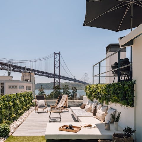 Enjoy views of the River Tagus from the shared rooftop terrace