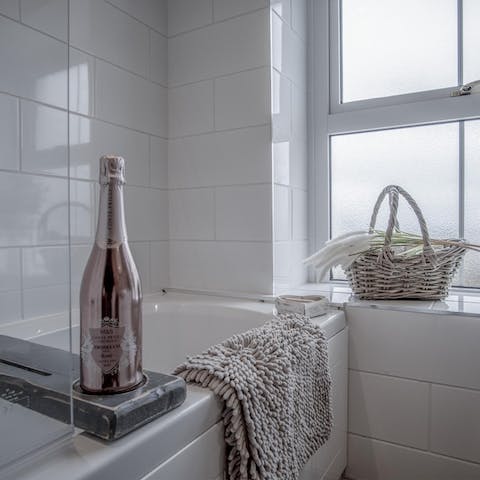 End the day with a glass of wine as you unwind in the bathtub
