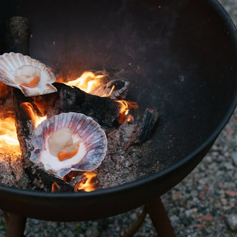 Curl up around the fire bowl outside or the roaring fire inside