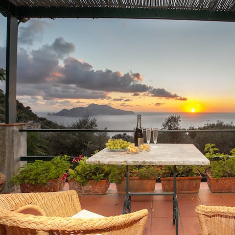 Relax on your patio and absorb the picturesque Capri coastline