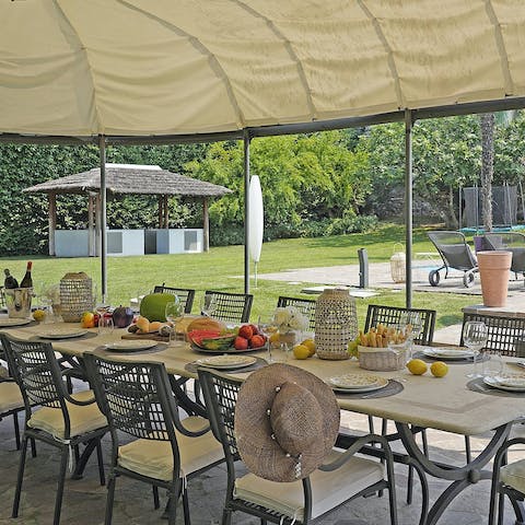 Enjoy a communal barbecue under the marquis