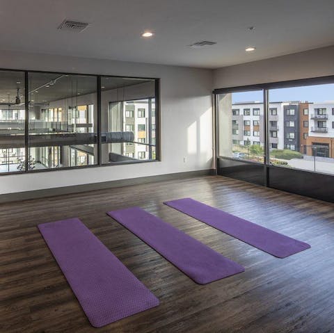 Do some yoga at the on-site studio