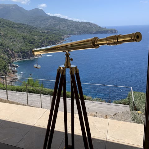 Admire the idyllic shores down below with the provided telescope
