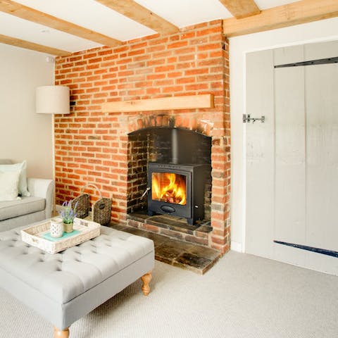Cuddle up by the roaring wood burning stove