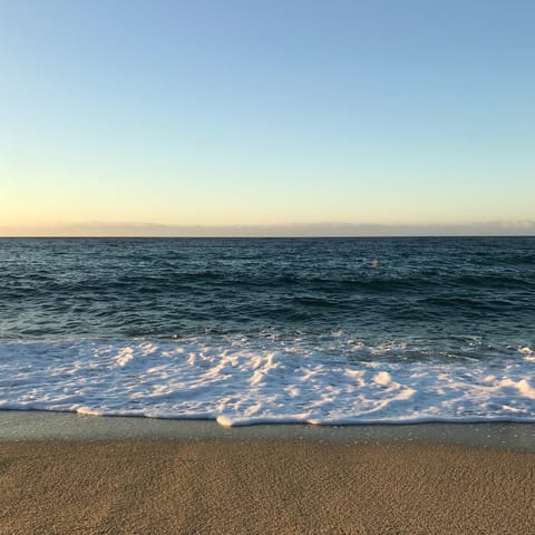 Walk 200m to a sandy beach