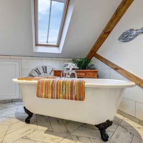 Treat yourself to a soak under the stars in the freestanding tub