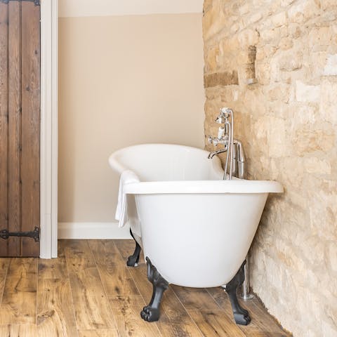 Take a soak in the clawfoot tub in the master bedroom