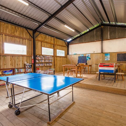 Challenge each other to a game of ping pong or table football in the games room