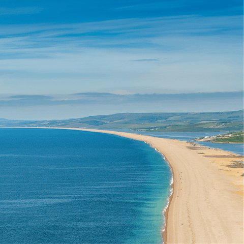 Visit the Jurassic Coast, located just a short drive away, for stunning beaches and rugged cliffs