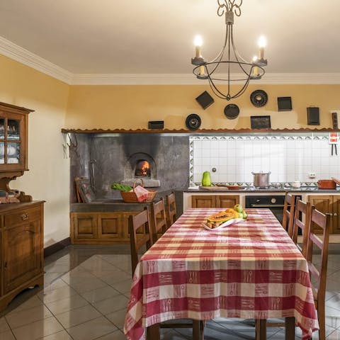 Cook traditionally with the original bread oven in the kitchen