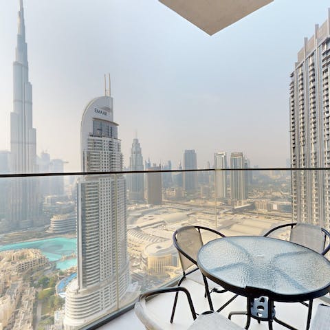 Look out over the Burj Khalifa from the private balcony