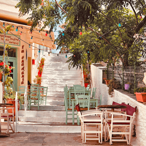 Drive over to Andros Town and sample the local cuisine in a taverna