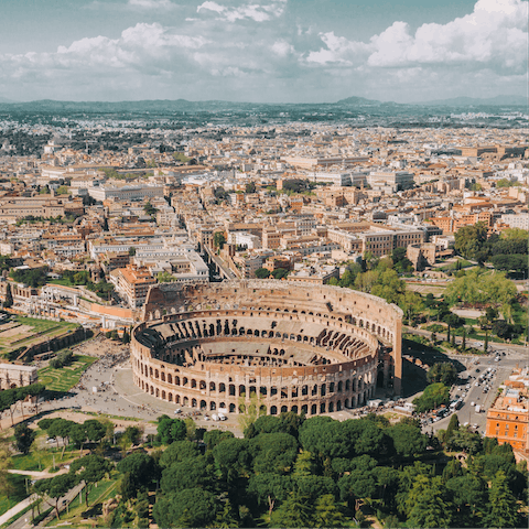 Hop on a bus to Rome's majestic and ancient Colosseum