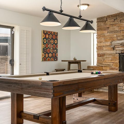 Share some drinks with friends while challenging your friends to games of pool