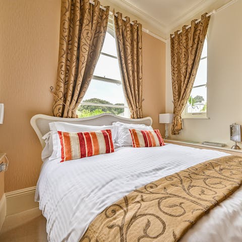 Enjoy beautiful views of the surrounding garden from the tower bedroom
