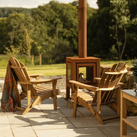 Gather around the outdoor fireplace as the quiet of nature surrounds you