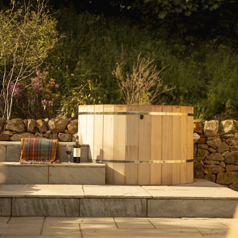 Relax in the cedar hot tub after a day exploring the great outdoors