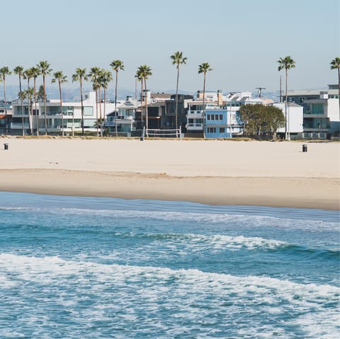 Drive twenty minutes and soak up the sun and surf at iconic Venice Beach