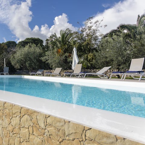 Go for a dip in the large private pool or relax on the sun loungers and work on that perfect bronze tan