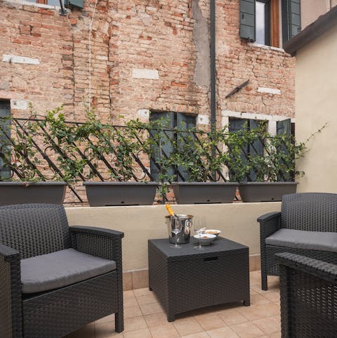 Enjoy a glass or two of Prosecco on the private terrace