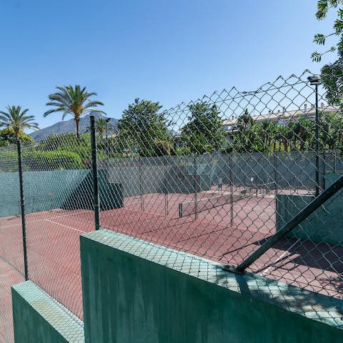 Work up a sweat on the tennis courts next door