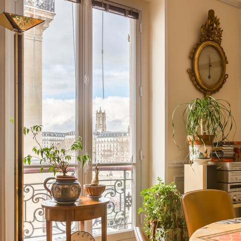 Take in views of the Seine and historic buildings from big French windows