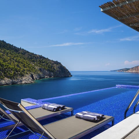 Soak up views of the sea from your infinity pool