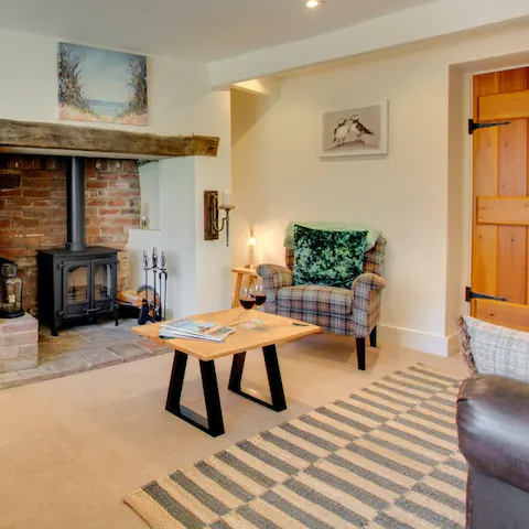 Settle down in front of the wood burner after a day exploring the coast