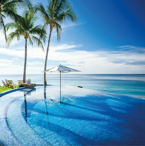 Cool off in the infinity pool with sea views