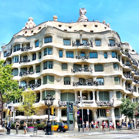 Admire Gaudí's impressive Casa Milà, a ten-minute walk away