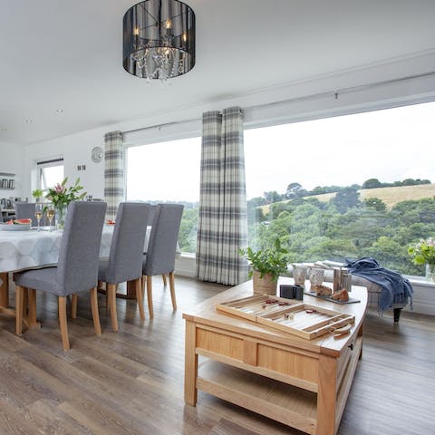 Gaze out at the bucolic Devon landscape through the floor-to-ceiling windows
