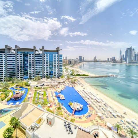 Dip between the communal pool and the building's private beach