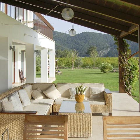 Relax and catch up in the shade of the veranda