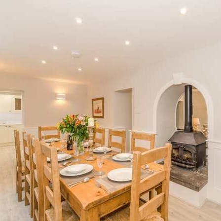 Enjoy cosy dinners by the traditional wood-burning stove