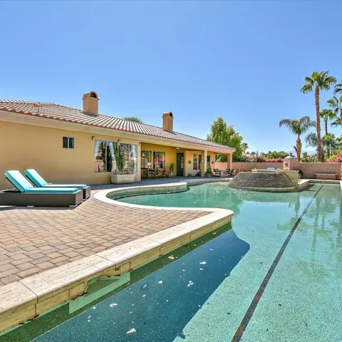 Slip out of the pool and onto the sun lounger to bask in the sun