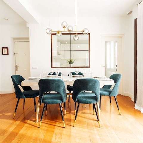 Gather the group for a celebratory meal in the elegant dining area