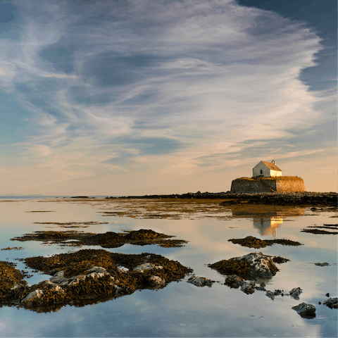 Explore the stunningly rugged beaches that surround the Isle of Anglesey