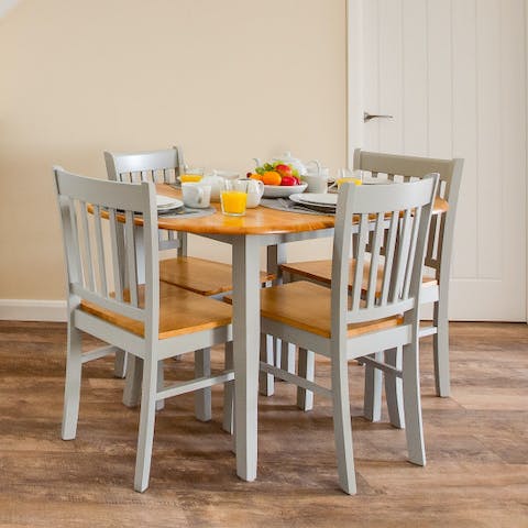 Tuck into tasty laverbread and cockles around the lovely dining table