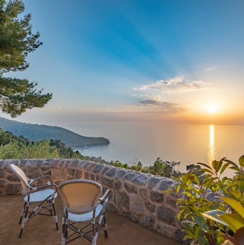 Sip your morning coffee as you watch the sun rise over the sea