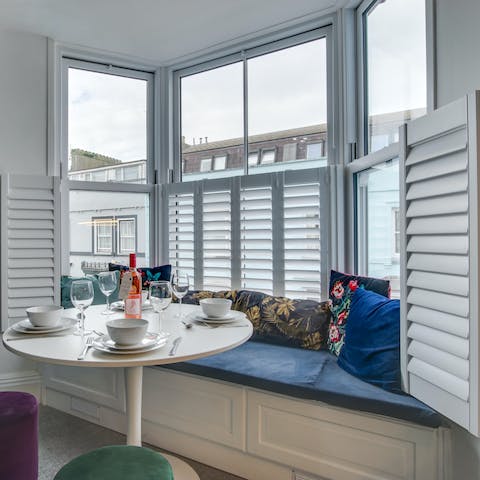 Seat in the window seat and plan your outings around this informal dining table